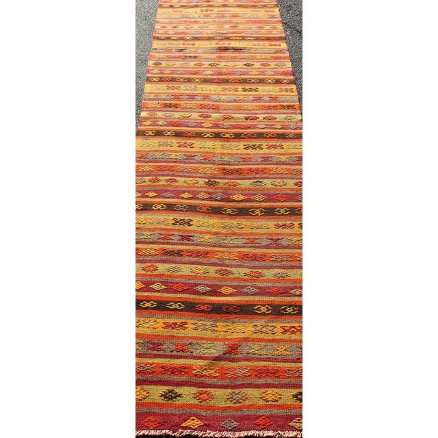 Measures: 2'9 x 10'6 Vintage Turkish Kilim Runner with Multicolor Stripes and Tribal Motifs2'9 x 10'6. Keivan Woven Arts /...