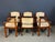 Exceptional set of Scandinavian modern stacking armchairs crafted in richly grained teak, likely produced in Denmark or...