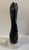 This abstract sculpture is constructed of black and white marble, with a white marble base. It's fluid form and minimalist...