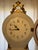 Elegant Swedish Mora longcase clock featuring a distinctive sculptural silhouette, cream-painted case, and decorative gilt...