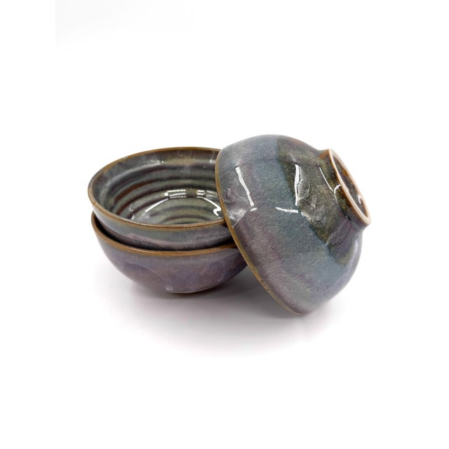 This elegant rice bowl set for four showcases the refined artistry of Bat Trang, Vietnam, renowned for its centuries-old...