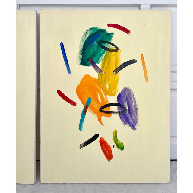 Here is a super fun pair of coordinating original abstract paintings on canvas. The background is a creamy yellow color...