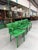 Set of 4 bright green ABS plastic chairs with armrests, designed by Anna Castelli Ferrieri for Kartell in the 1980s. These...