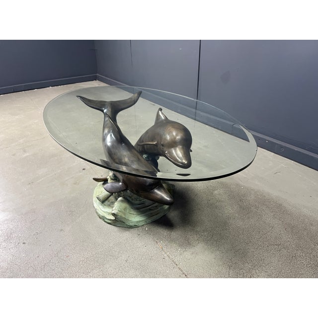 Bronze Dolphin Coffee Table from C Caudion, 1960s, in Very Good conditions. Designed 1960 to 1969