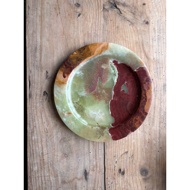 Striking vintage onyx decorative bowl featuring dramatic natural banding in shades of celadon green, rust, amber, and deep...