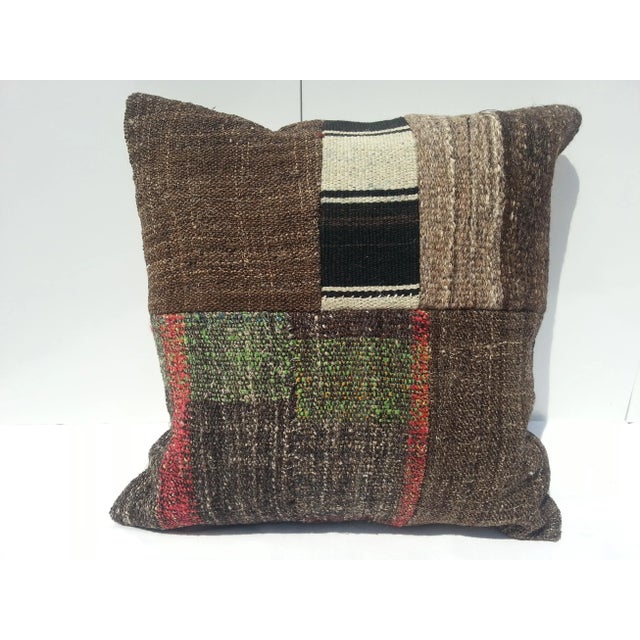 Pillow cover made from handwoven vintage Turkish Anatolian rugs. We collect old vintage rugs, cut them and design our own...