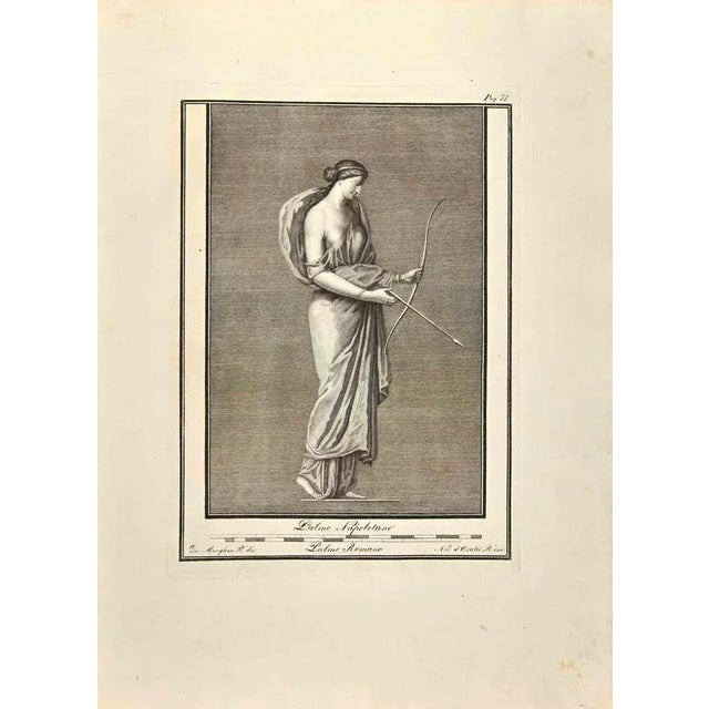 Artemis Goddess from "Antiquities of Herculaneum" is an etching on paper realized by Giovanni Morghen in the 18th Century....