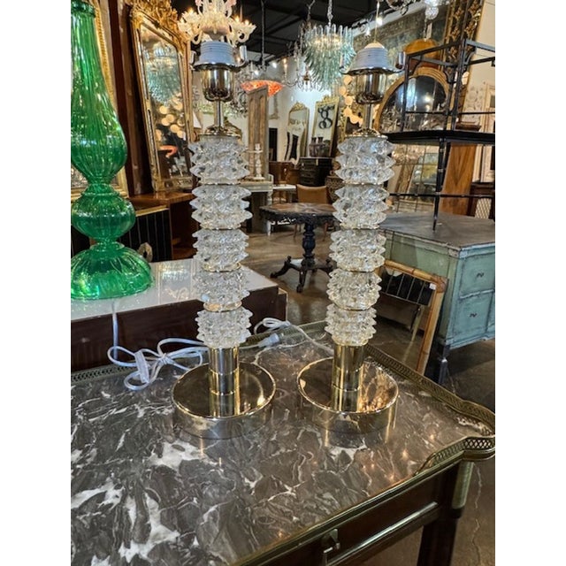 The Pair of Murano Rostri Lamps are exquisite glass lighting fixtures handcrafted in the renowned glassmaking town of...