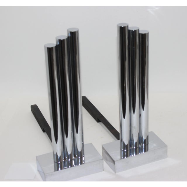 Skyscraper streamline Moderne 1930s-1940s polished chrome andirons by Donald Deskey from a Palm Beach estate. These are...