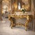 Transform your home into a palace of sophistication with this spectacular 62.6” gold console table. A true show-stopper,...