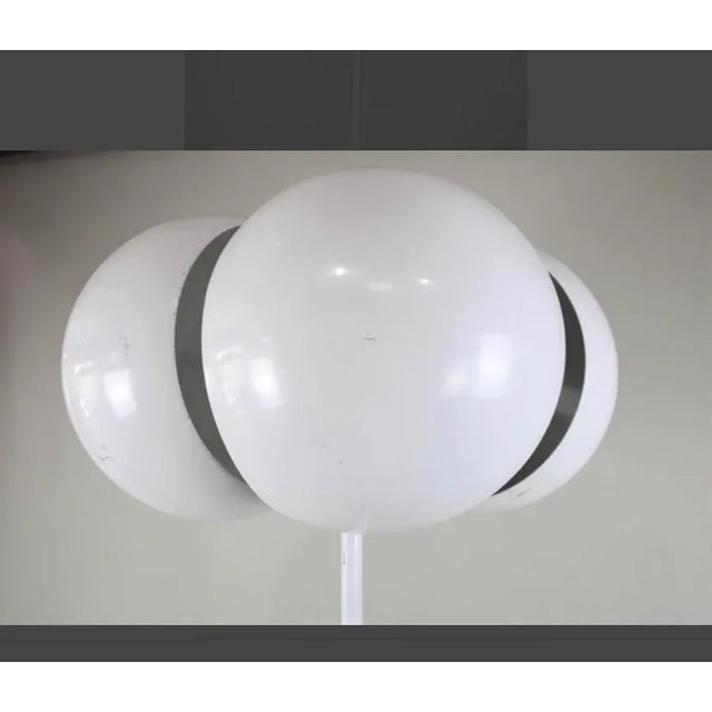 Very rare find! Made in the 1970’s by Vico Magistretti. Super striking proportions and design. The lamp has four...