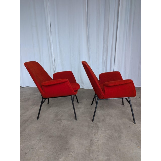 SET of 2 vintage lounge chairs. Made in the 1960s in Yugoslavia. Armchairs are made from metal base and red fabric....