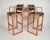 This beautiful pair of Danish modern bar stools feature a teak frame with sled legs. Unique design with high rounded arm...