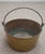 An antique thick cast brass pot with a forged iron bail handle from th mid-19th-century. Almost a quarter inch thick cast...