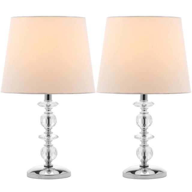 Inspired by a Irish crystal candlestick design, the stacked crystal orb table lamp bridges traditional and transitional...