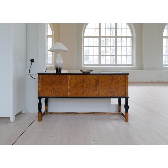 This rare table lamp was made in the begging in 1900. Made at Rörstrand factory and designed by Astrid Ewerlöf. The lamp...