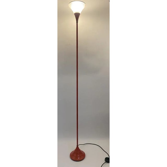 a floor lamp *Slim floor lamp with a funnel-shaped base and glass shade that opens gradually upwards. *Without...