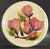 A stunning English art studio pottery plate A very cheerful piece with a boldly colored central decoration in relief,...