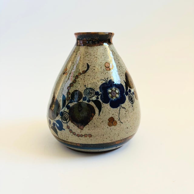 A vintage Mexican folk art Tonala pottery vase. Speckled gray glaze with beautiful hand painted imagery of a bird and...