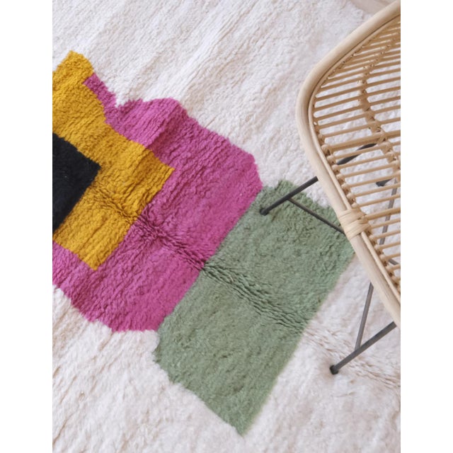 Bring modern design and soft comfort to your home with our Moroccan Modern Wool Rug. This 9.5 x 6.7 ft area rug adds a...