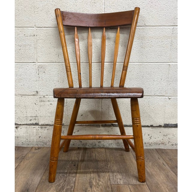 This is an amazing antique primitive 19th century handmade farmhouse plank seat spindle back chair. Solid and sturdy, with...