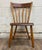 This is an amazing antique primitive 19th century handmade farmhouse plank seat spindle back chair. Solid and sturdy, with...