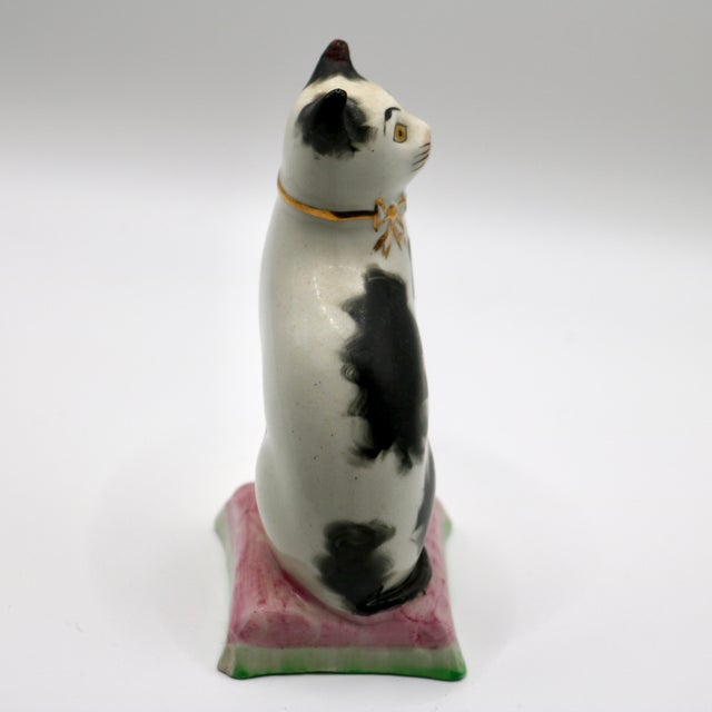 Add a touch of whimsical English traditionalism to your mantle, bookshelf, or vignette with this charming antique...