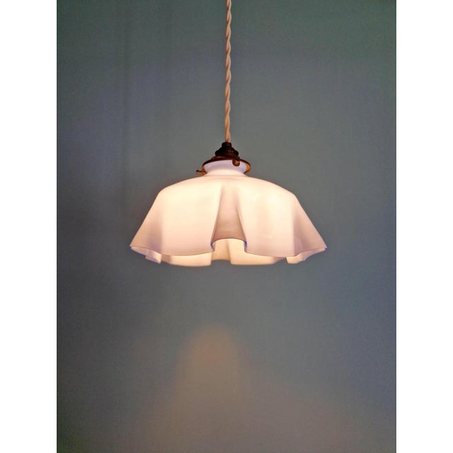 Art Deco pendant light in pleated mauve opaline glass, 1920s-30s. The pendant has been rewired and is compatible with a...