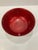 This finely crafted silver plate bowl has a rich red enamel interior Reed & Barton label and sticker are attached