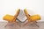 Pair of Folke Ohlsson scissor lounge chairs for DUX, made in Sweden during the 1950s–1960s. The chairs feature solid beech...