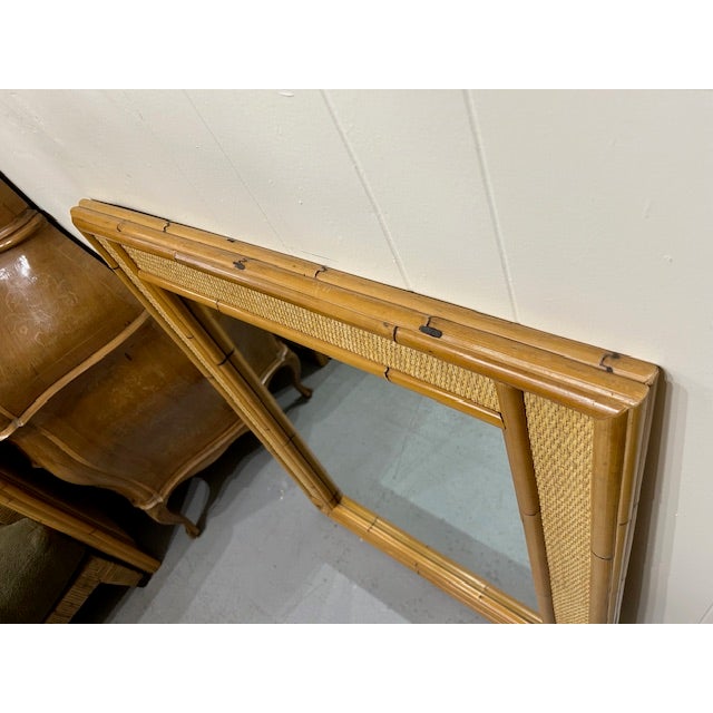 20th Century cane rattan bamboo mirror by Bielecky Brothers. No markings, but it is apparent and originally purchased with...