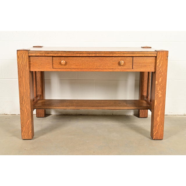 A gorgeous antique Mission or Arts & Crafts period quarter sawn tiger oak writing desk or library table In the manner of...