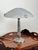 A striking example of French Art Deco lighting, this elegant table lamp features a beautifully molded frosted glass shade...