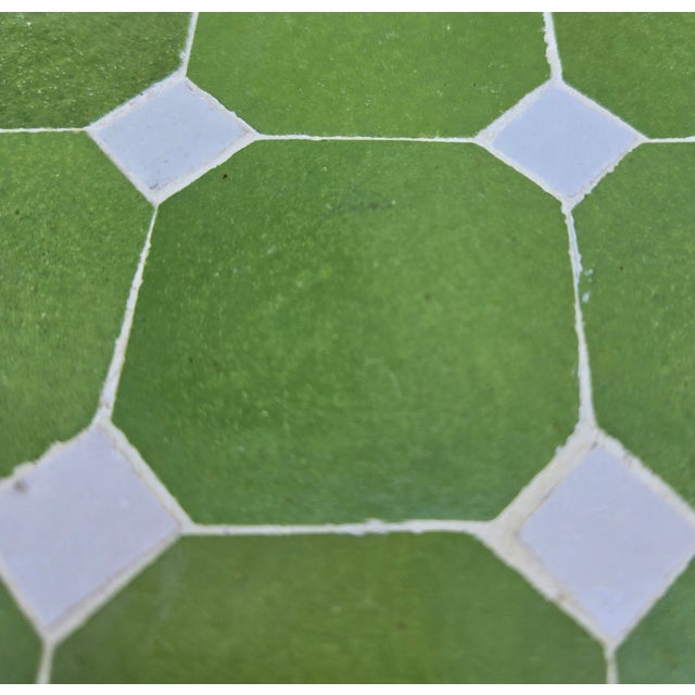 Beautiful lime green and white mosaic tile table. An indoor / outdoor table of approximately 24" x 24" and 29" in height....