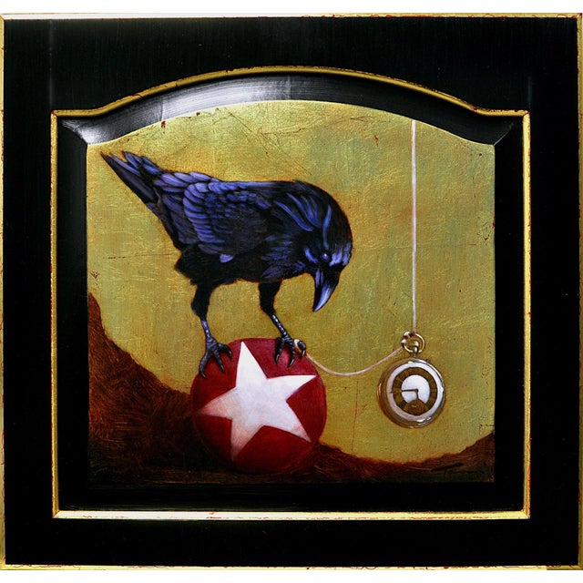 Fire in Which We Burn by Tammi Otis | Oil Painting of a crow balancing on a red ball For Sale