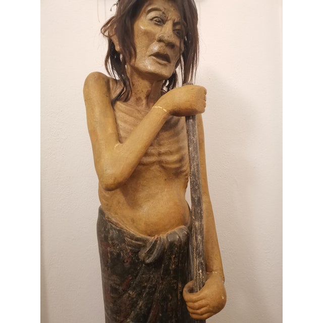 This sculpture is a profound realisation of the "Sick Man," one of the pivotal Four Sights from the Buddhacharita, the...