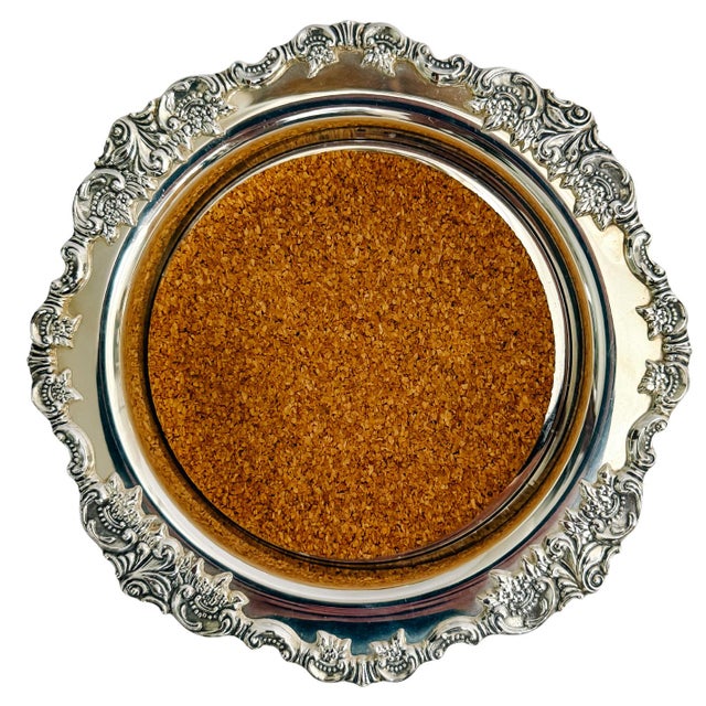 Elevate your tablescape or bar cart with this pair of vintage wine bottle coasters in the iconic "Baroque" pattern by...