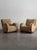 A substantial pair of Danish Art Deco easy chairs from the 1930–40 period, newly upholstered in caramel sheepskin with...
