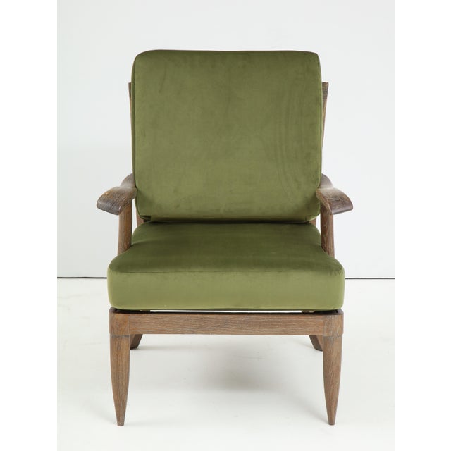 Pair of French mid-century cerused-oak armchairs/ lounge chairs with slatted backs and curved arms, very comfortable....