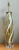 This vintage Murano table lamp features a hand-blown glass body where warm amber and white hues spiral gracefully around...