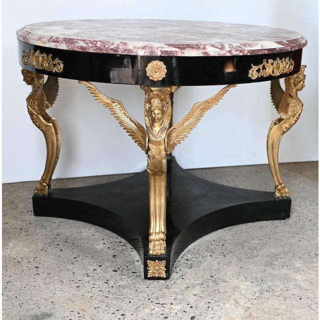You are viewing a stunning lacquered centre table in the French Empire style Features a large marble top which is smooth...