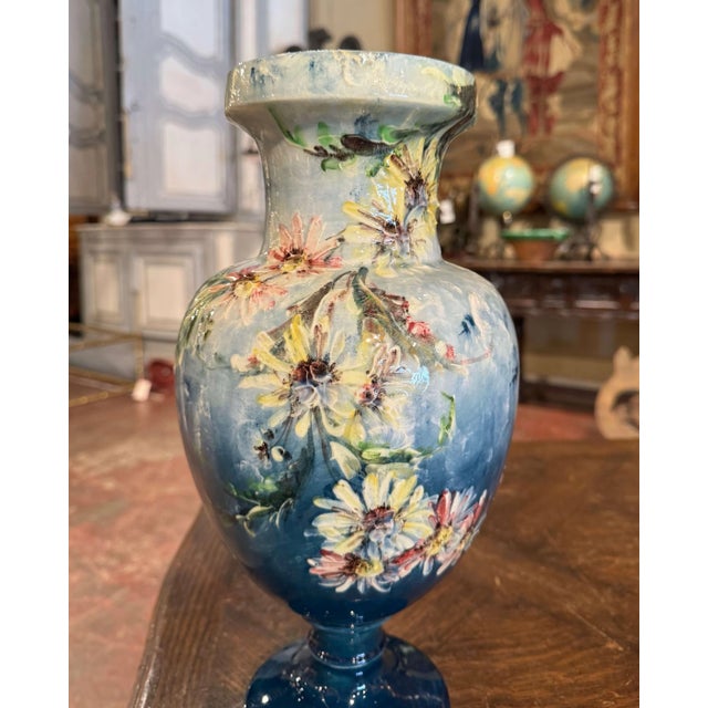 Decorate a shelf of a console with this elegant colorful majolica vase. Sculpted in Vallauris, France, circa 1890, and...
