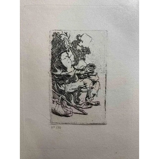 Beggar Seated Warming His Hands at a Chafing Dish is an engraving on ivory-colored paper realized by Charles Amand Durand...