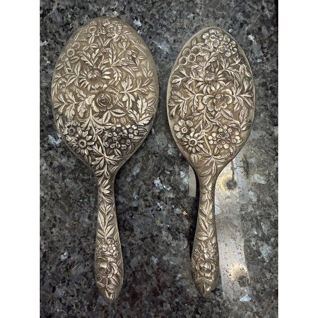 Large Antique S. Kirk & Son Sterling Silver "Hand Decorated" Repoussé Vanity Set This magnificent and rare large-scale...