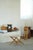 A Swedish Modern Model 203 folding stool designed by Uno & Östen Kristiansson for Luxus Vittsjö in the 1960s. Crafted in...