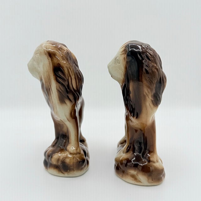 A pair of vintage ceramic lion figurines turned bookends with a wonderfully cinematic presence. Finished in layered tones...