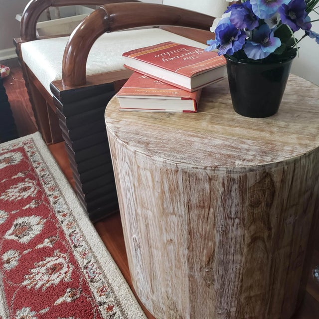 This exotic reclaimed solid wood 18-inch cylindrical accent table will add an eye-catching style to your living room or...