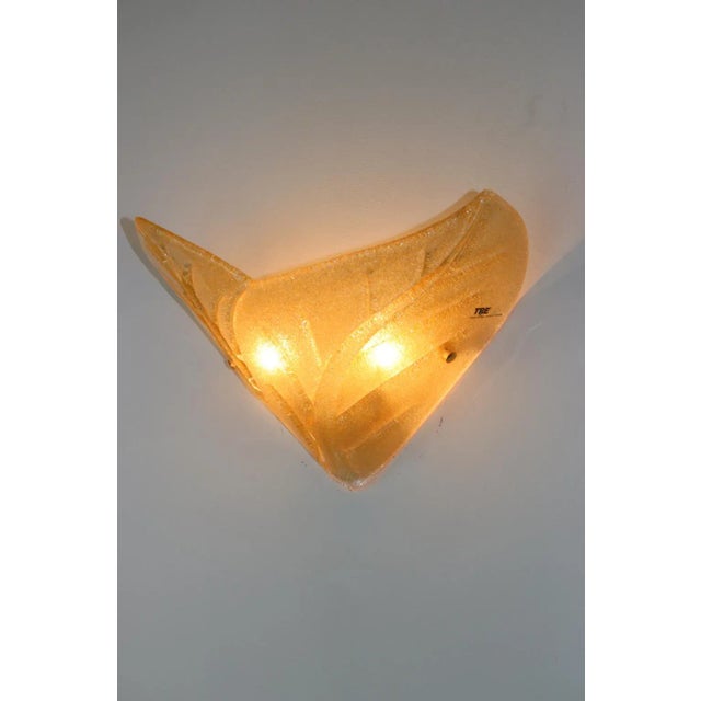 Carlo Nason Wall Lamp Murano Hand Cast Glass Amber Rugiada with decorative pressed-in Details "fracco". Hardware: white...