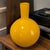 This Vintage Mid-Century-Modern Hand Blown Cased Art Glass Orange Vase is a stunning piece of decorative glassware. Made...