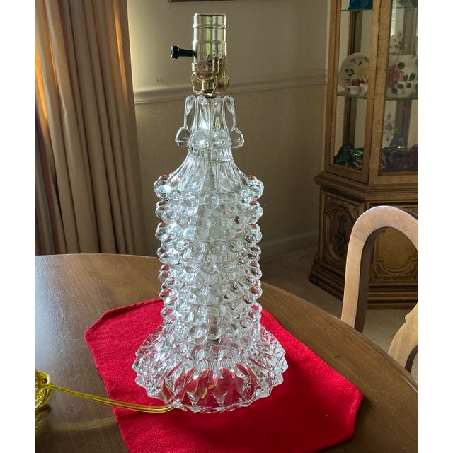 Mid Century glass lamp in the style of Carl Fagerlund. Heavy glass made with individual layers that sparkle in the light....